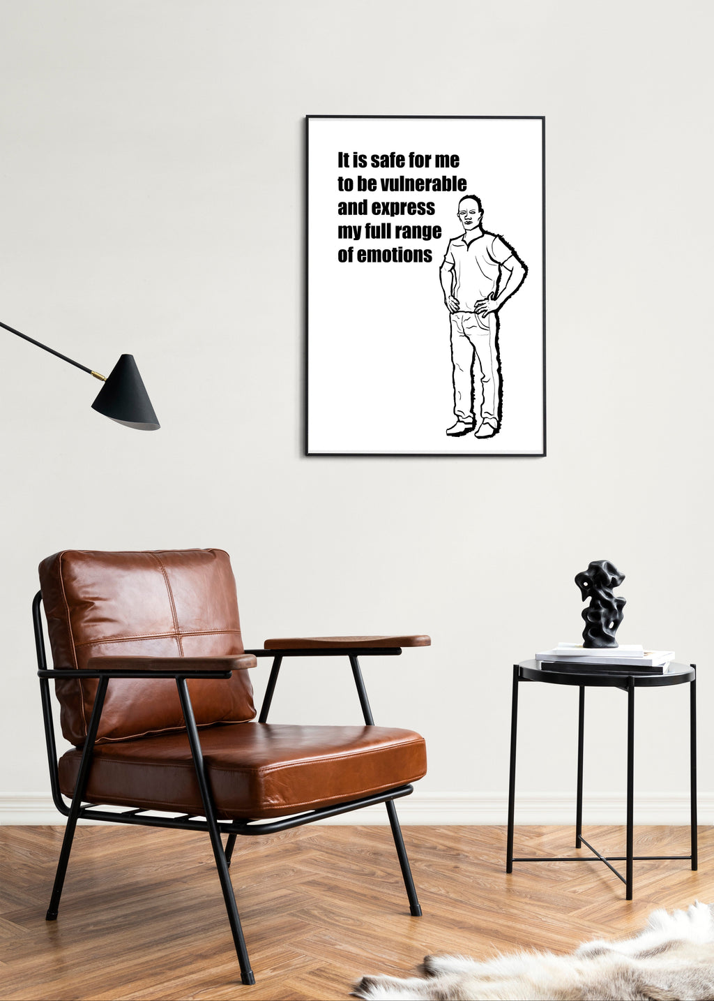 Living room with brown leather armchair, side table, and motivational poster on the wall.