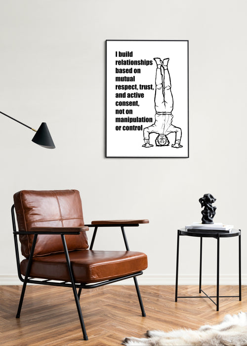 Living room with brown leather chair, black table, and framed poster on wall.